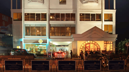 Facade View of Abad Plaza hotel on MG Road, Ernakulam