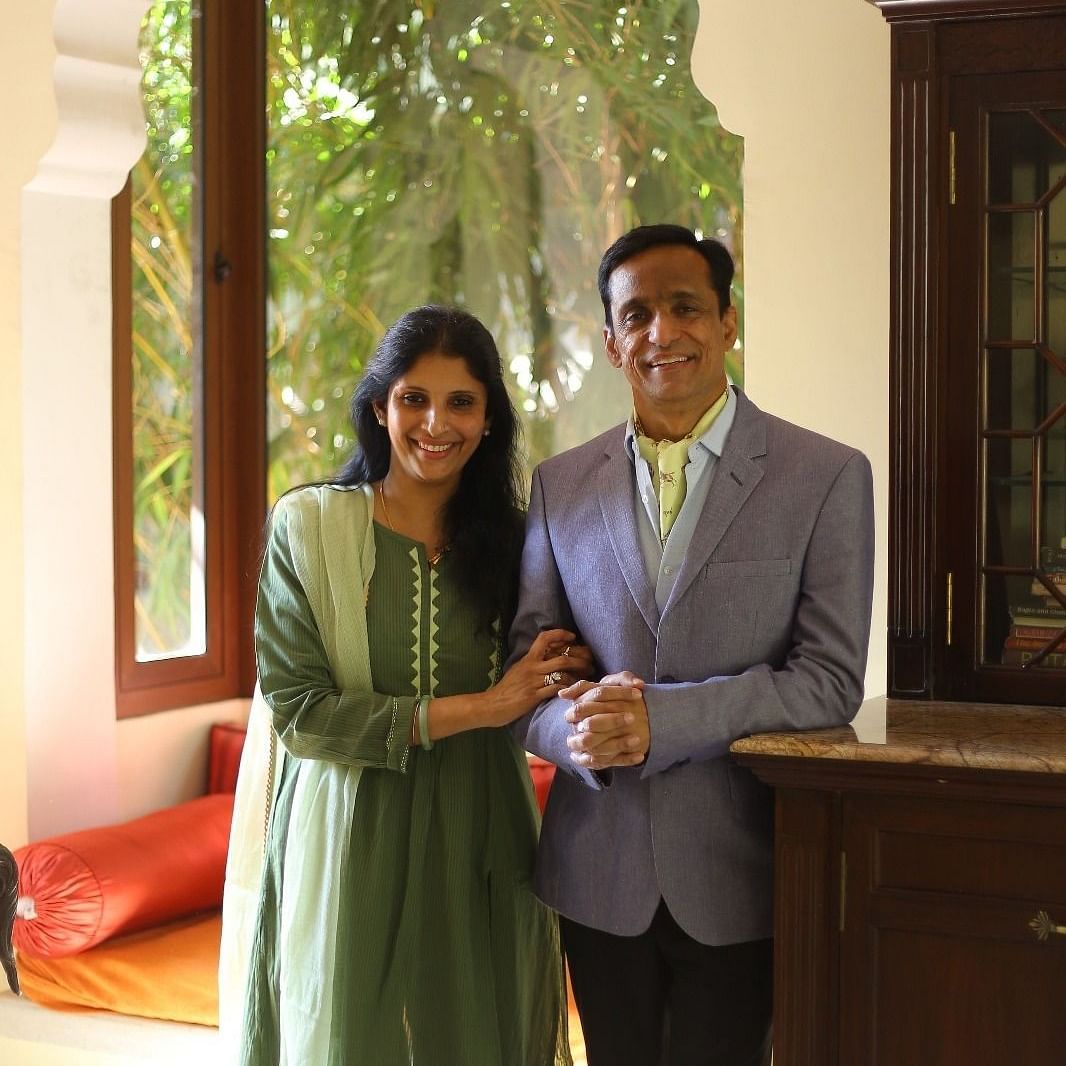 Mrs. Mandvi Ranawat & Mr. Anirudh Singh Rawatsar standing near a cabinet in one of the rooms at Dileep Kothi, Jaipur