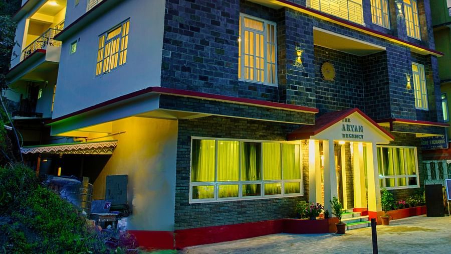 facade of a building shot from a lower angle during sunset - Voyage hotels