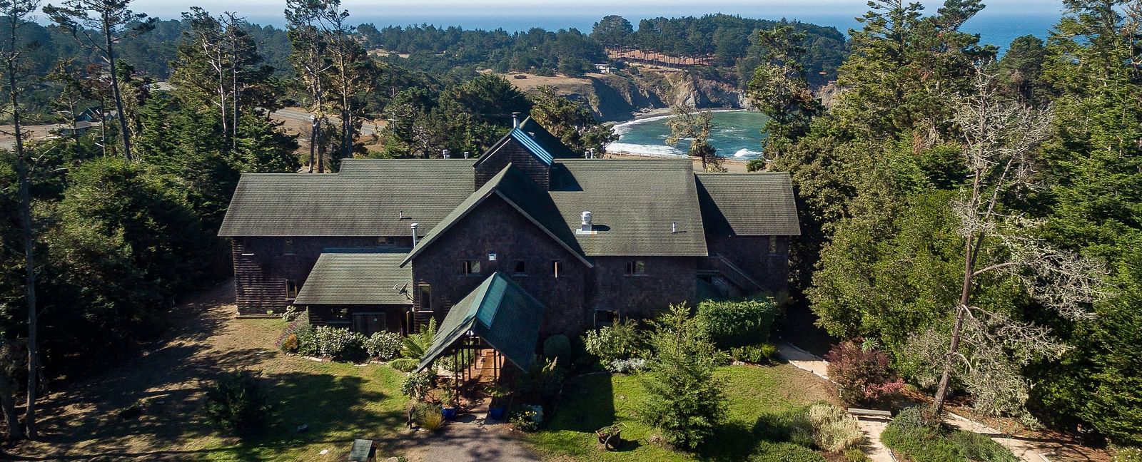 A breathtaking aerial view of a hotel near the Mendocino coast - Brewery Gulch Inn & Spa