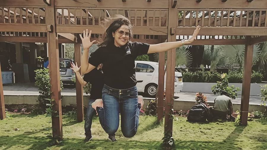 Woman jumping in mid-air - Rhythm Lonavala