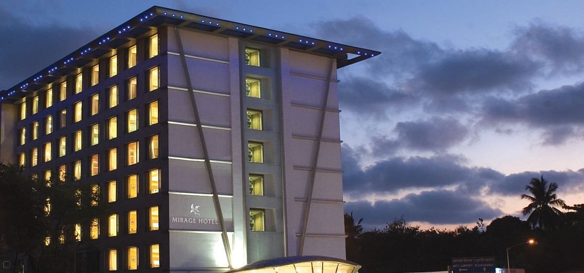 Shot of the facade of the hotel during the evening with a backdrop of the sky. | Mirage Hotel