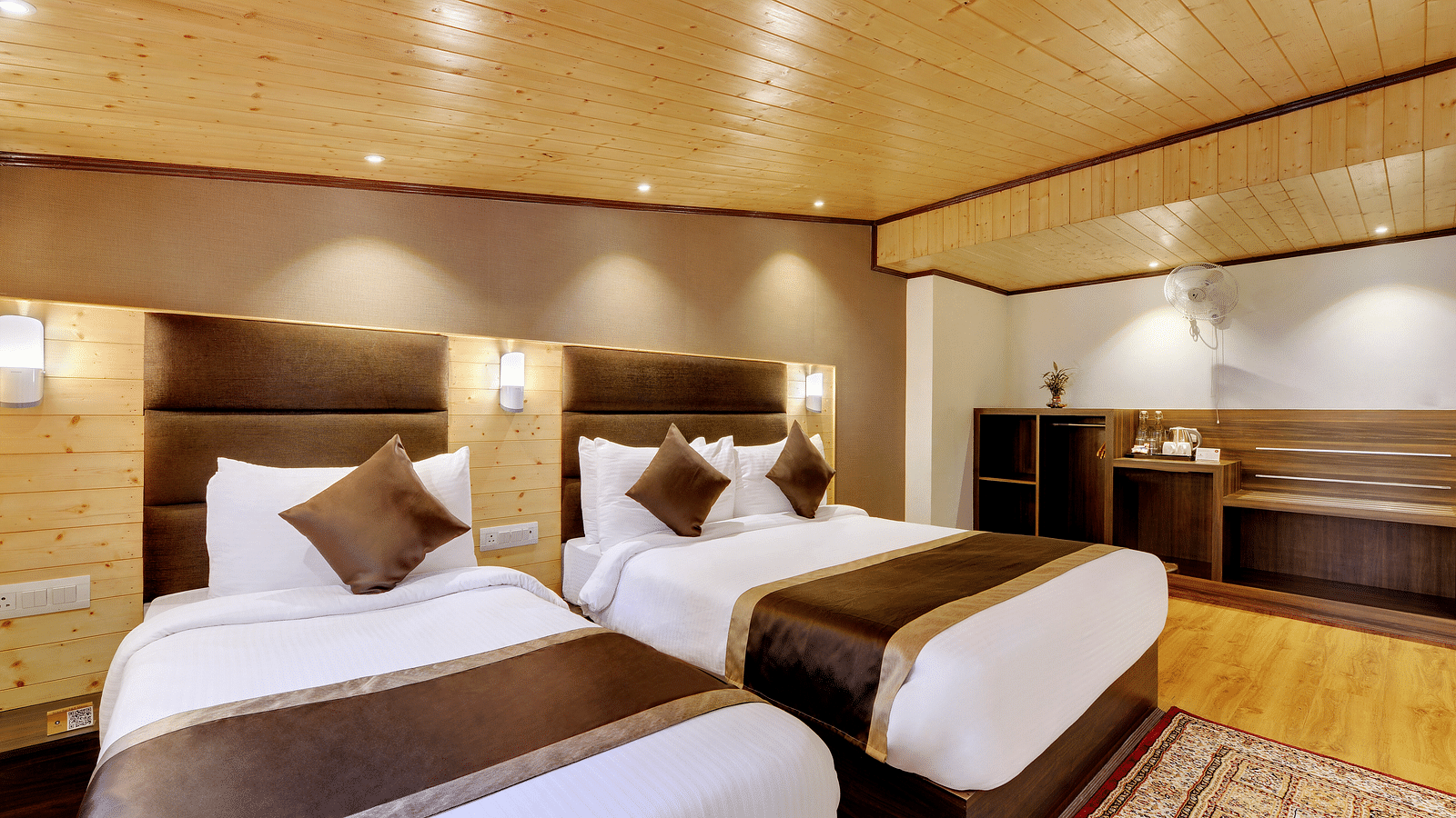 Image of a room with twin beds and wooden ceiling - Sumitel Shangrila, Deorali
