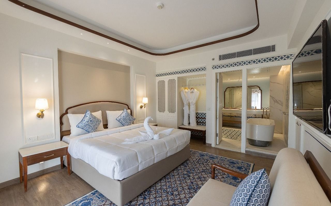Full view shot of the luxurious bedroom at Ananta with ample of natural lighting at Bhagirathi by RDB Atishay.