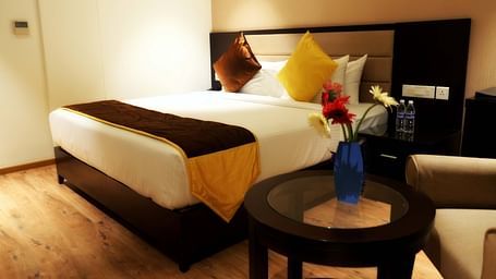 view of king size bed of Premium Room of ASR Parklane, Hosur