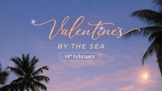 A Valentine’s Day promotional banner for The Resort, Mumbai, featuring their seaside hotel at dusk with palm trees, glowing lights, and information about the experience inclusions.