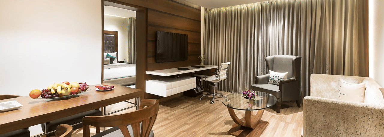 Living Room of Deluxe Suite at Grand Chennai By GRT Hotels.