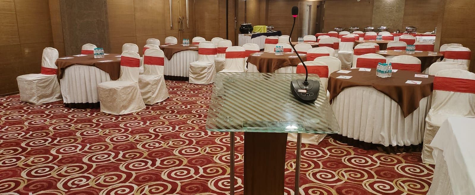 A spacious and elegant hotel room with a flat-screen TV and a welcoming ambience at The President Hotel Jayanagar, Bangalore