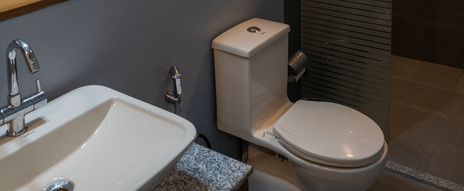 A bathroom featuring a geyser and toiletries at BluSalzz Escapade Resort, Lansdowne
