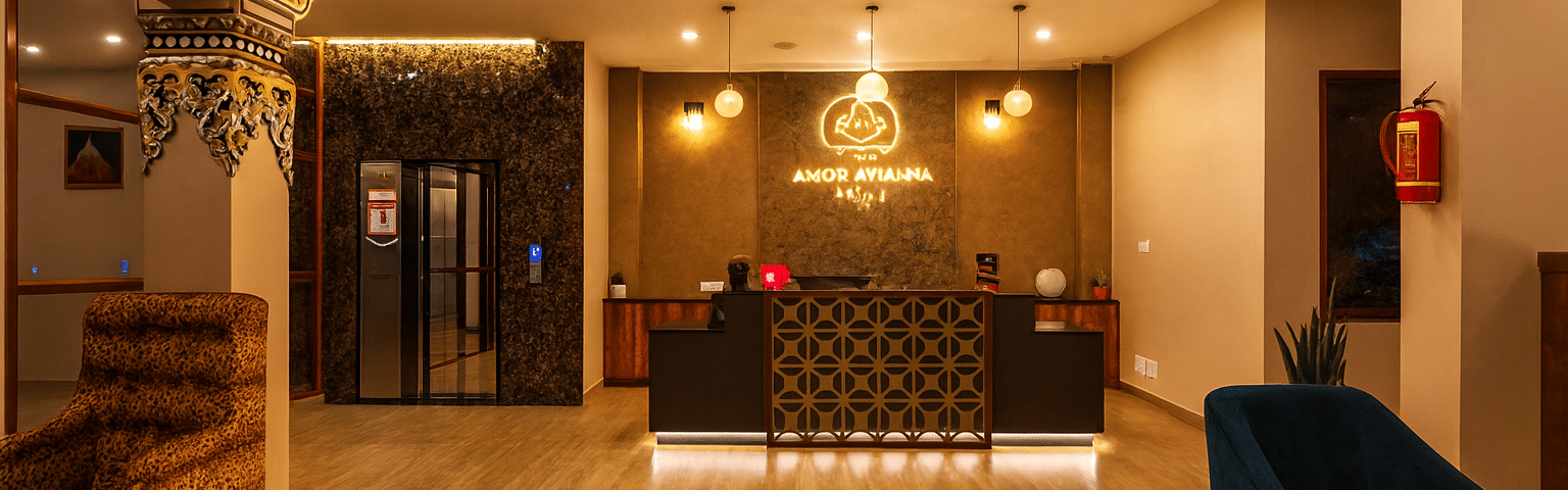 Spacious luxury resort lobby in Gangtok with modern reception desk, premium lighting, elegant seating area, and welcoming ambience at Avianna Hotel