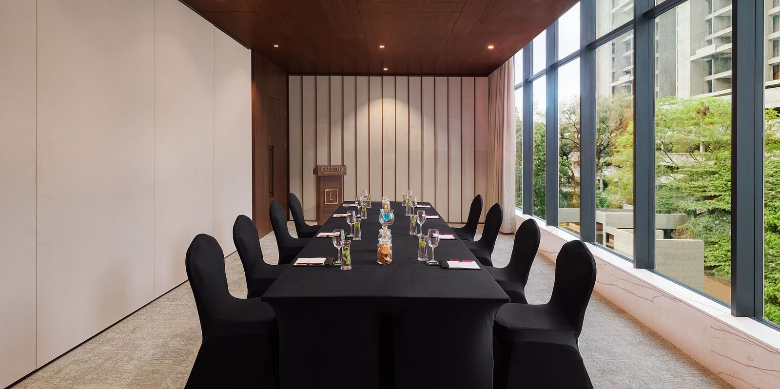  Carnival 1 with comfortable chairs facing towards the table at Essentia Premiere, Pune