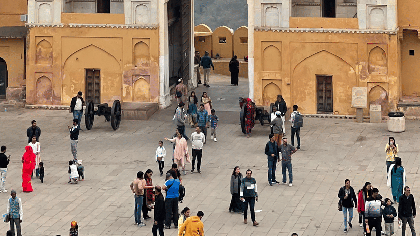 Suraj Pol, the main entrance of Amer Fort with bustling tourists.