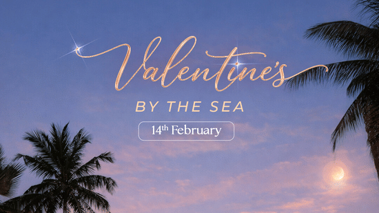A Valentine’s Day promotional banner for The Resort, Mumbai, featuring their seaside hotel at dusk with palm trees, glowing lights, and information about the experience inclusions.