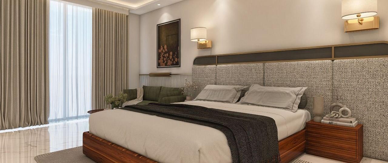 A room with modern interiors and bright lighting featuring a double bed in the middle along with two bed side tables. - Namaste Corbett
