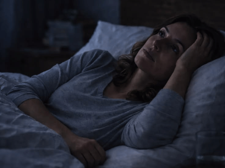 A guest resting in a comfortable bed at YO1 Longevity & Health Resorts, experiencing a peaceful night’s sleep in a calm wellness-focused setting.