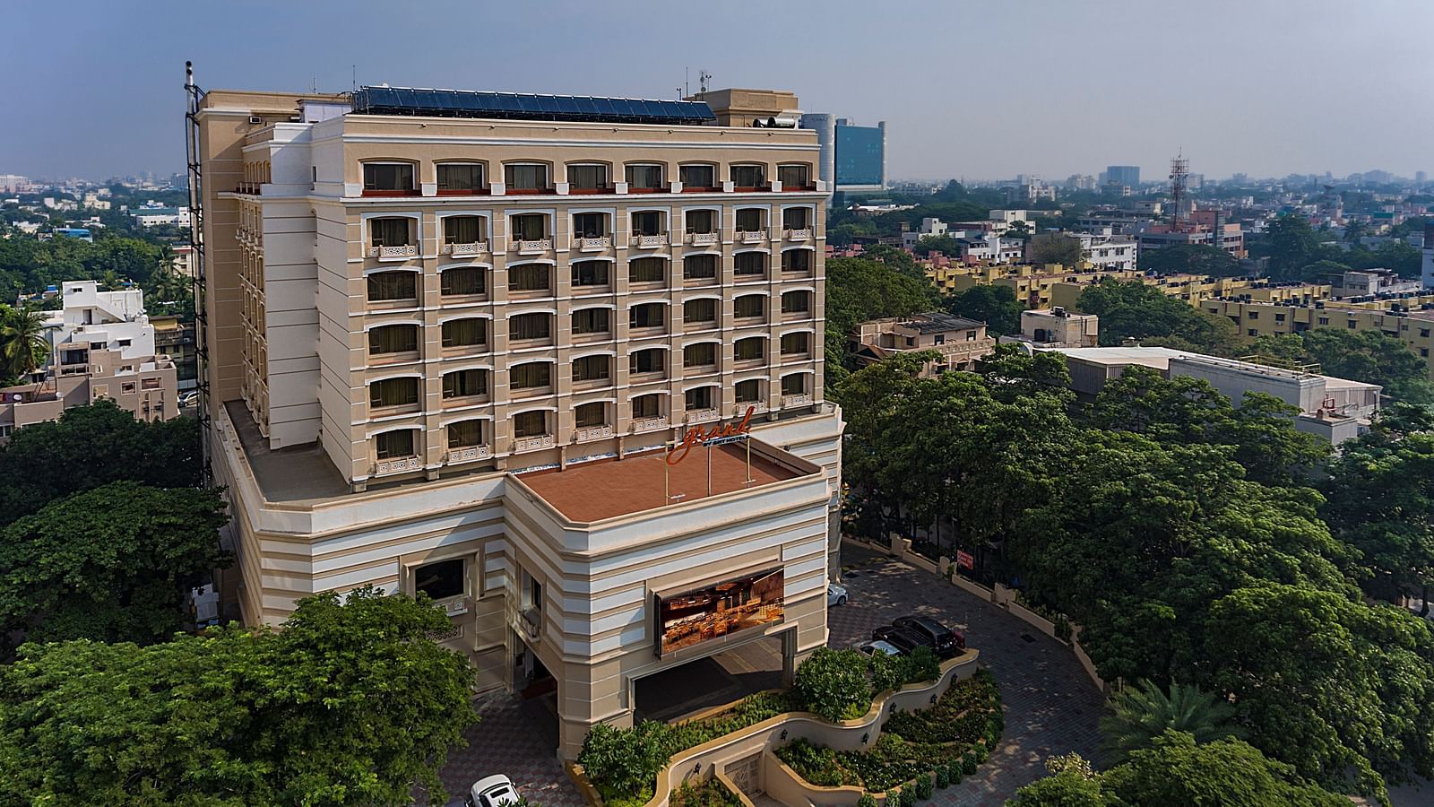 Facade view of Grand Chennai By GRT Hotels during day time.