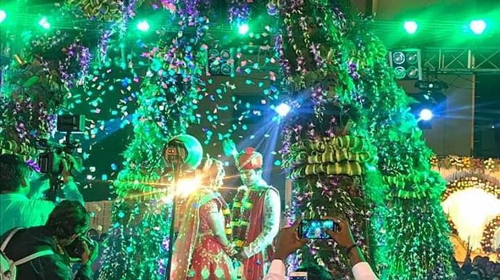 people celebrating a wedding of a couple on the stage - Wedlock Greens Hotel Resorts Dhanbad