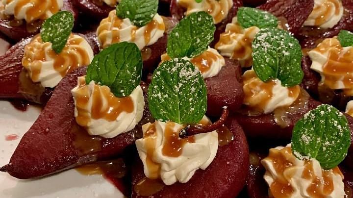 Stuffed peppers topped with creamy cheese and herbs - Brewery Gulch Inn & Spa