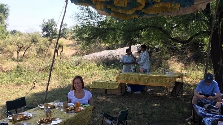 Dining arrangement in a field - Dev Shree, Deogarh
