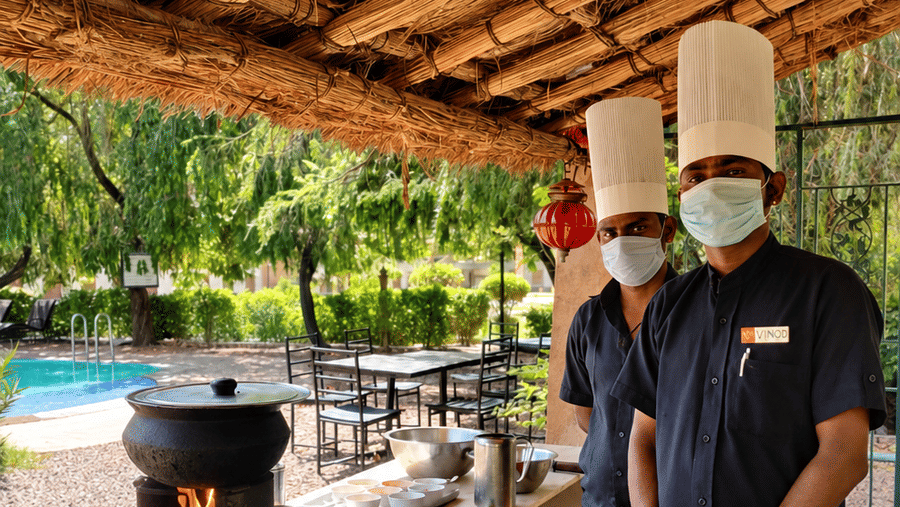 Rustic Live-Fire Cooking and barbecue by the pool at Umaid Palace Dausa-Resort near jaipur
