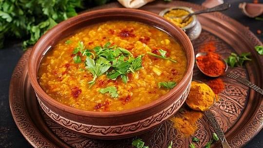 A curry garnished with fresh coriander