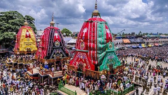 Rath yatra with a large group of people standing in front of a crowd