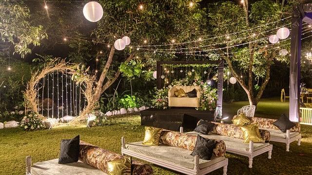 alt-text Buffet area with decorative lighting and food displays.