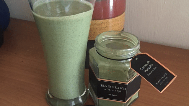 A jar of spinach powder and smoothie at Hablis Hotel, Chennai