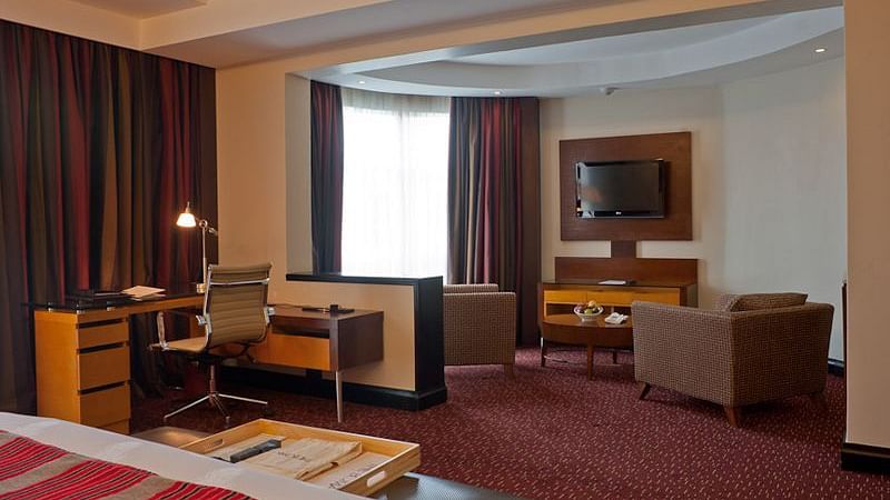 Deluxe room lounge area - Rooms in Nairobi