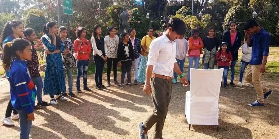 Guests participating in an outdoor group activity organised by Clarks Amer