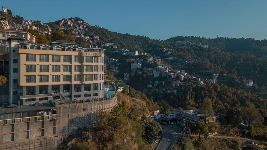 facade image of the zion, shimla amidst the mountains