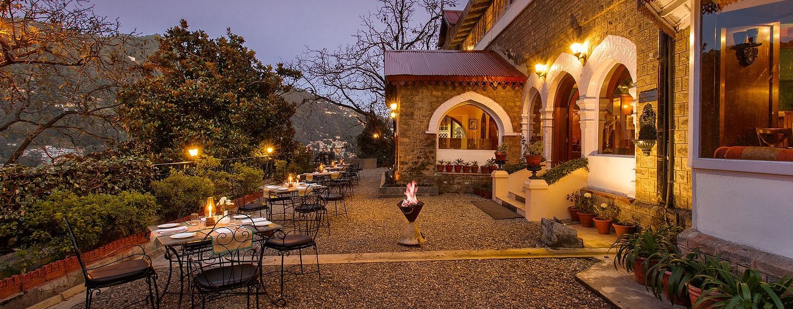 The picture Naini Retreat's outdoor captured in the evening with well lit ambience- Nainital Heritage Hotel