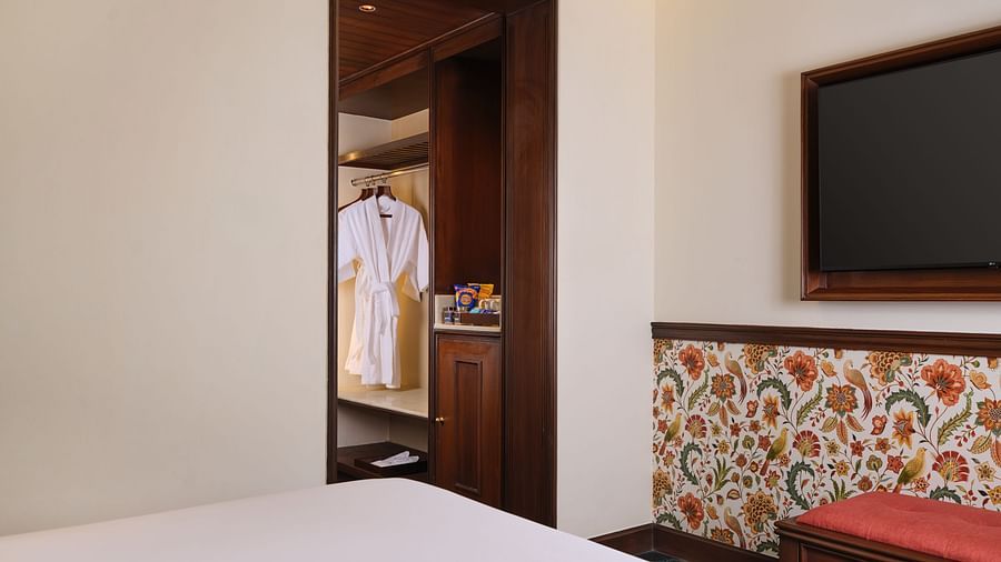 The Premium King Garden View Room at The Ummed Ahmedabad is designed for comfort with a king size bed and a stylish wardrobe