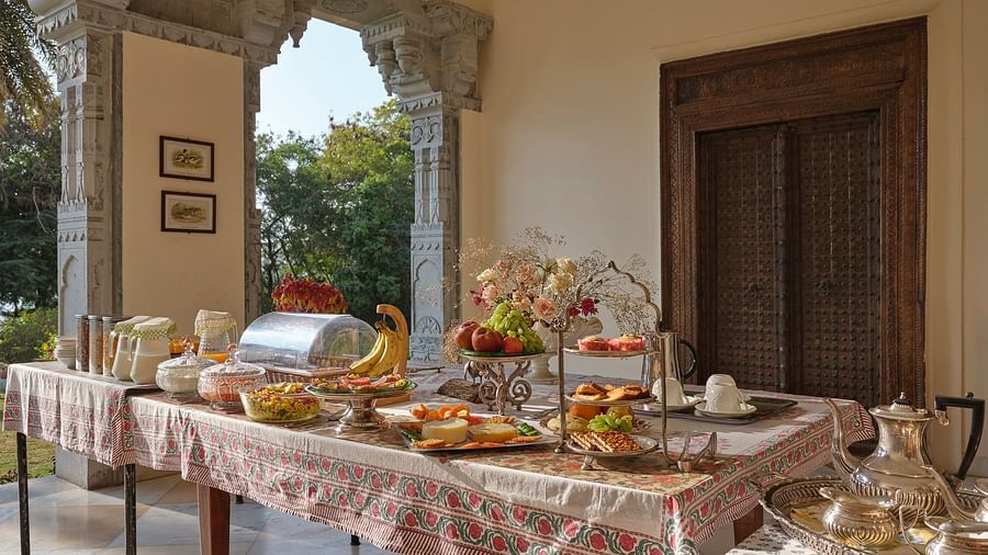 image of the table with a variety of food dishes served at dev shree, deogarh