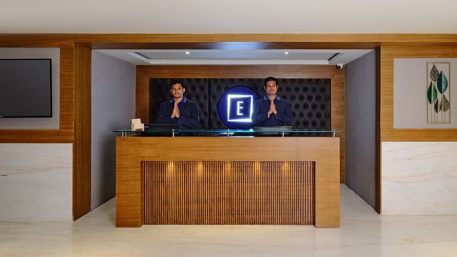 Reception desk in the lobby area of Essentia Premier Hotel, Chennai