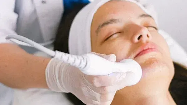 facial machine being applied on the face