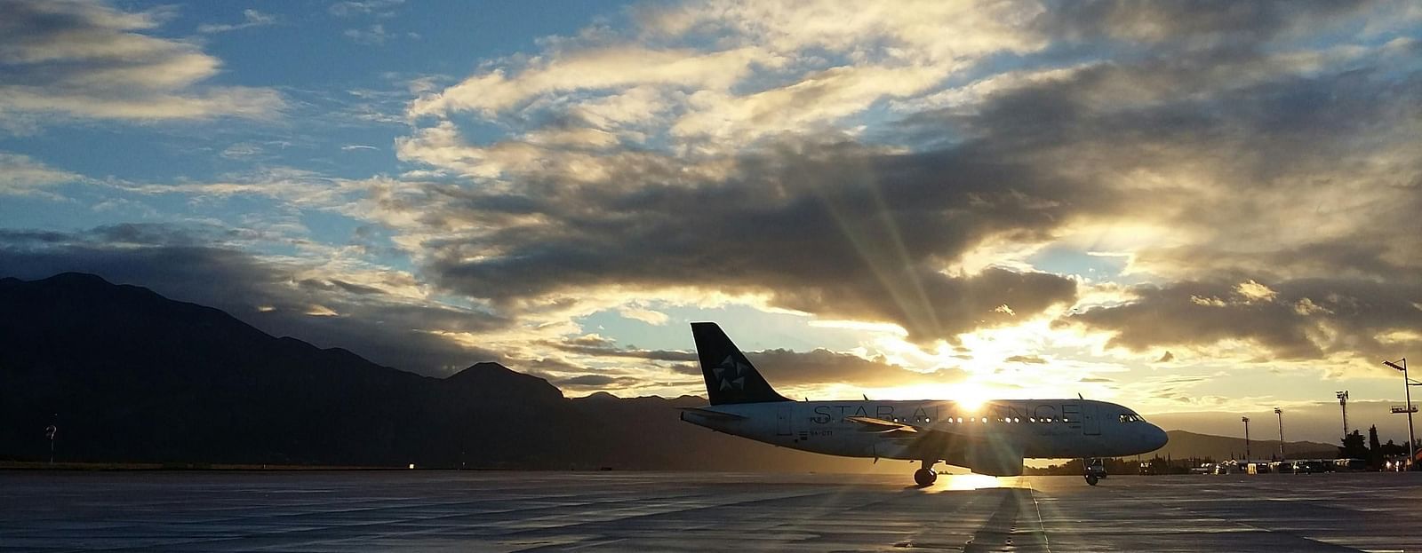 An image of an aeroplane at the runway