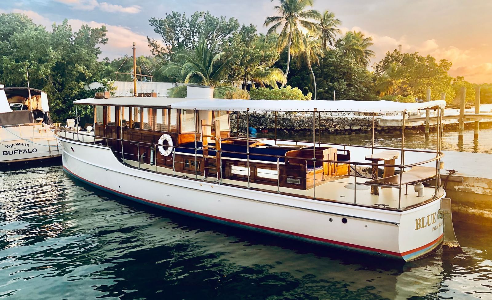 Side-view shot of the Blue Mist overlooking the tropical landscape along with a beautiful cloudy sky in the background at Casa Morada.