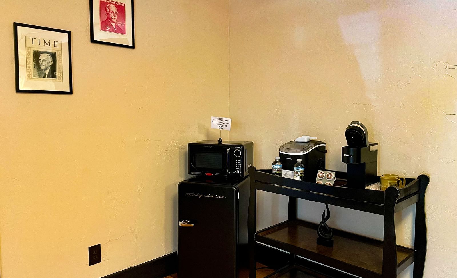 a corner of the room featuring a mini refrigerator along with a microwave and several other modern appliances - Historic Tapoco Lodge