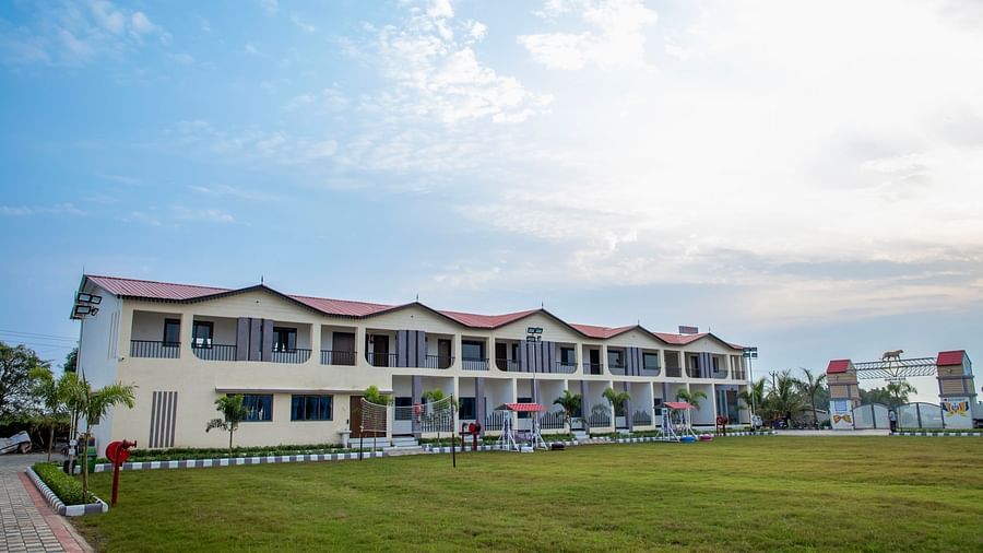 Facade image of the resort with a beautiful blue coloured sky with clouds in the background - VITS Select Diamond Resort, Sasan Gir