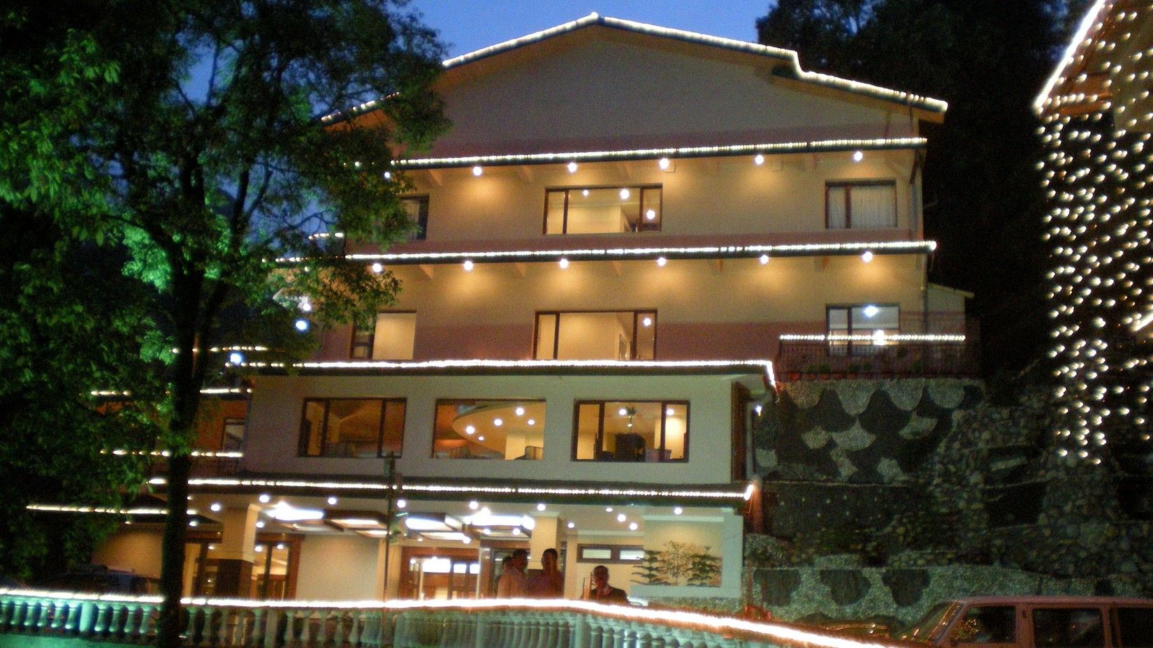 Facade with swimming pool at our hotel in Mussoorie, Hotel Madhuban Sarovar Portico, Mussoorie
