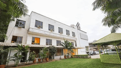 Facade image of VITS Select, Bharuch during an overcast day. 