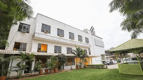 Facade image of VITS Select, Bharuch during an overcast day. 