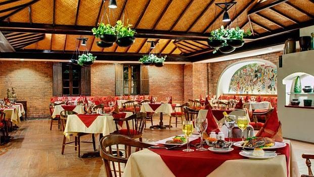 Seating arrangement at our restaurant at Caravela Beach Resort - Restaurants in South Goa