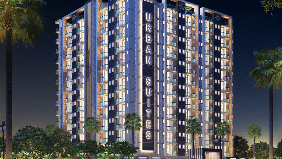 Facade view of Urban Suites by BluSalzz, Jaipur against the night sky, with the building glowing beautifully in the evening light.