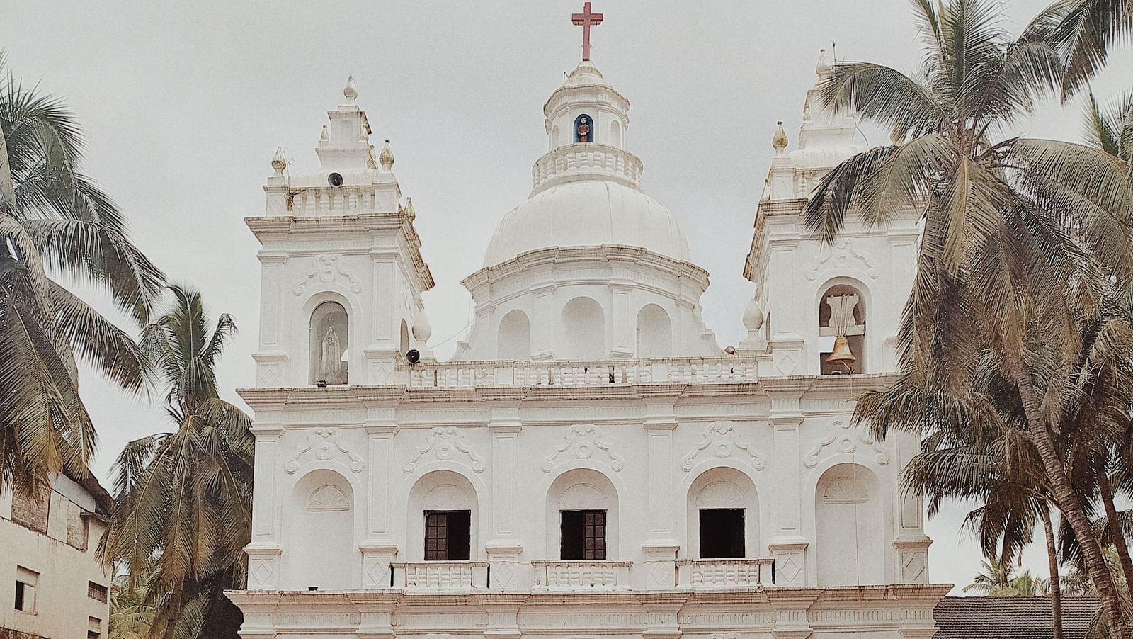 image of a church daytime with stone foyer in front of it