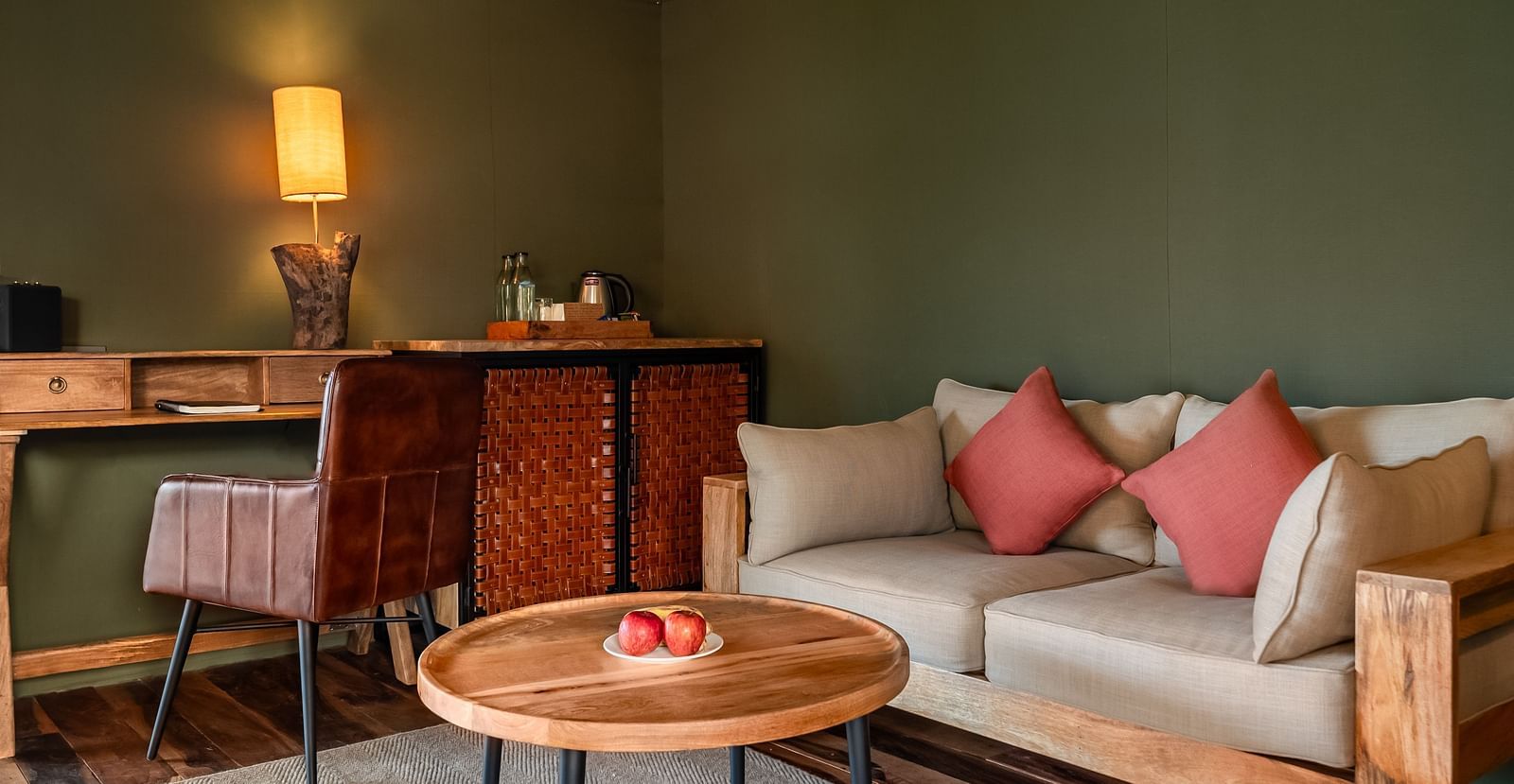 A sofa and a small tea table at Trees N Tigers, Tadoba.