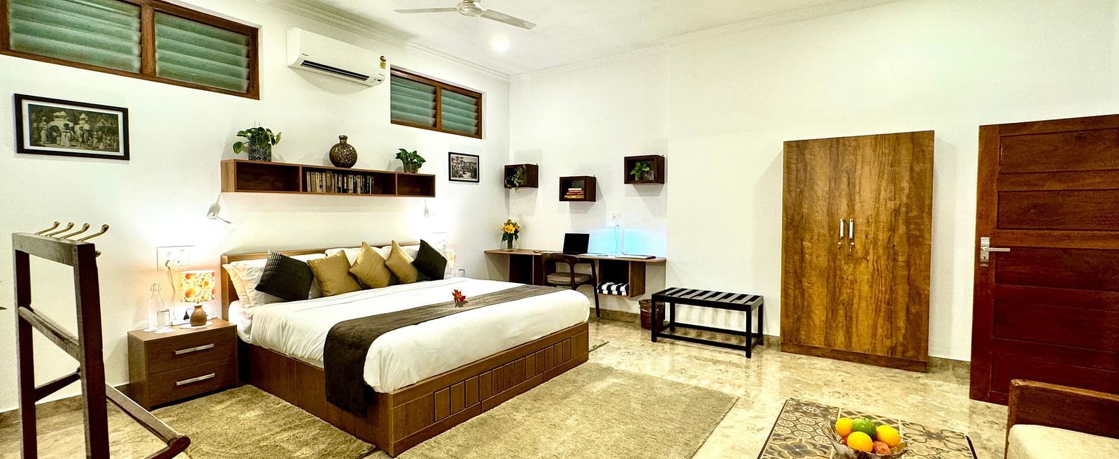 Another view of the bedroom showing a seating area and wardrobe - BluSalzz Collection - Tranquil Resort, Wayanad