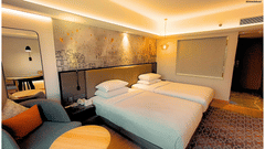 Serene Deluxe Twin Room with Soft Lighting