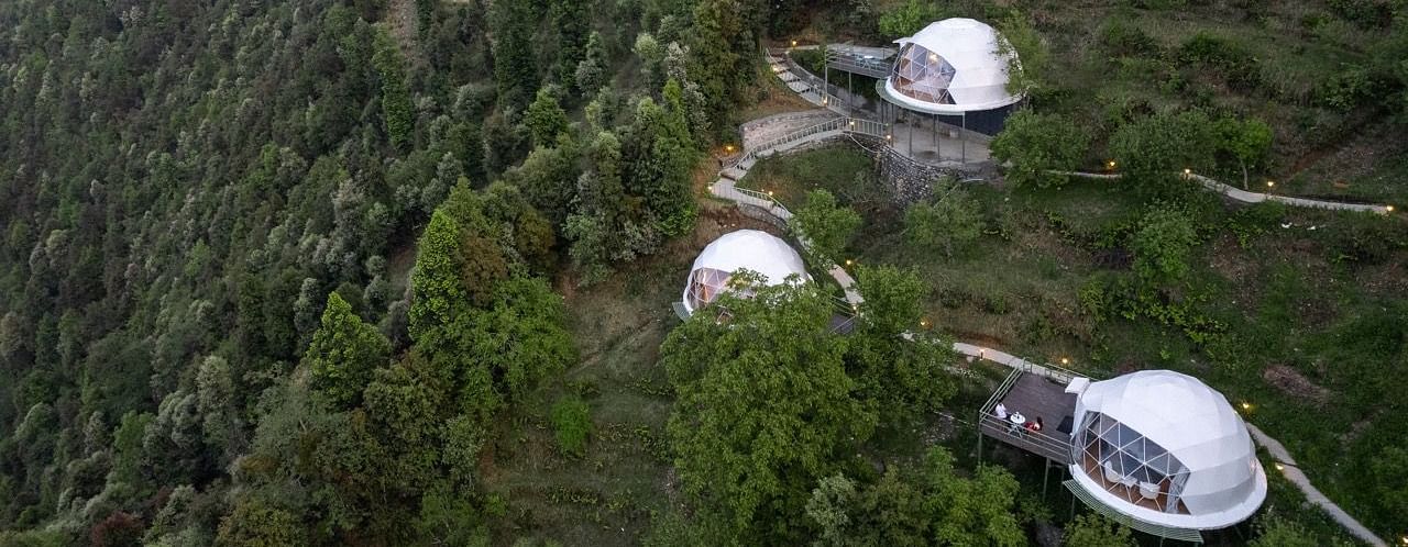 A drone shot of dome cottages at avalon | Avalon Cottages, Kanatal